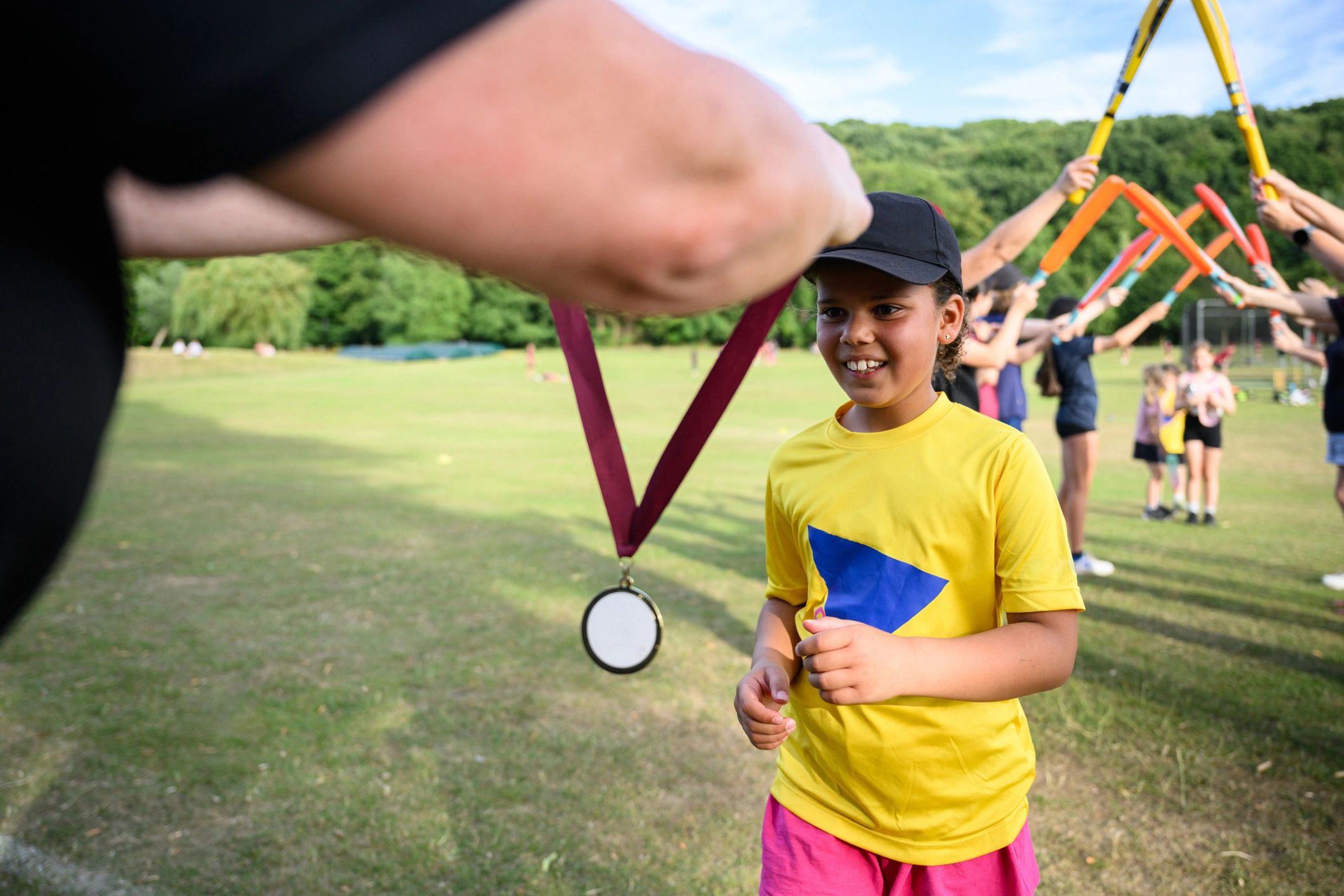 Youth athlete receiving a medal